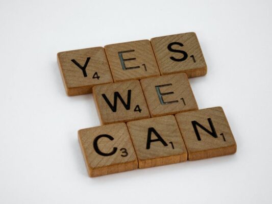 Sign saying: Yes we can