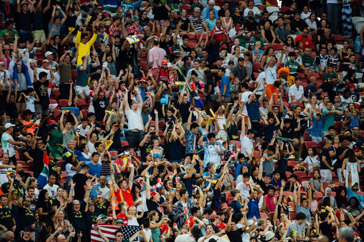 Fans cheering at a football match