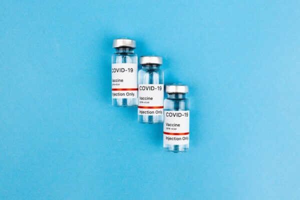 Three Covid-19 vaccine bottles