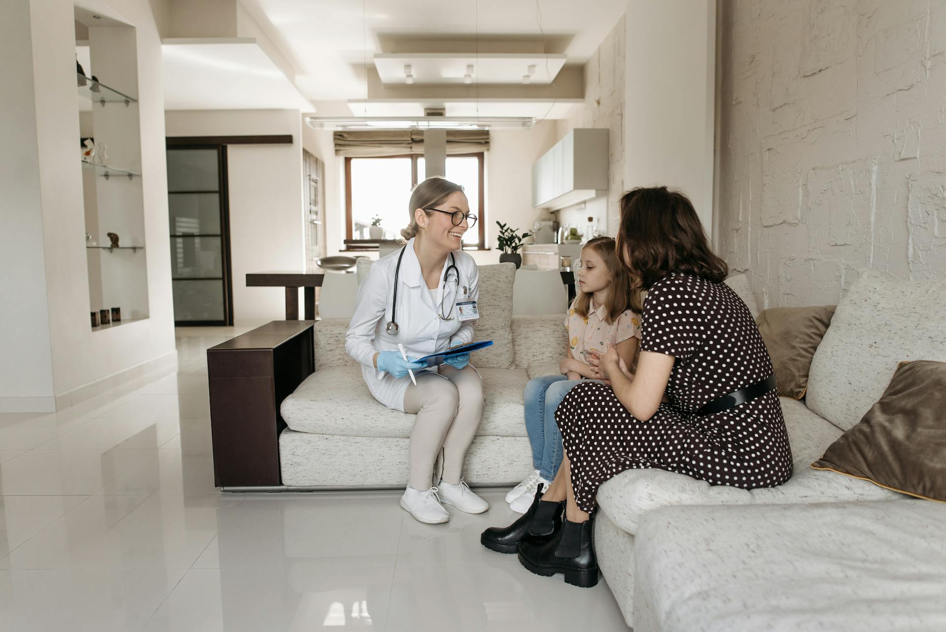A Doctor Checking a Child during a house visit